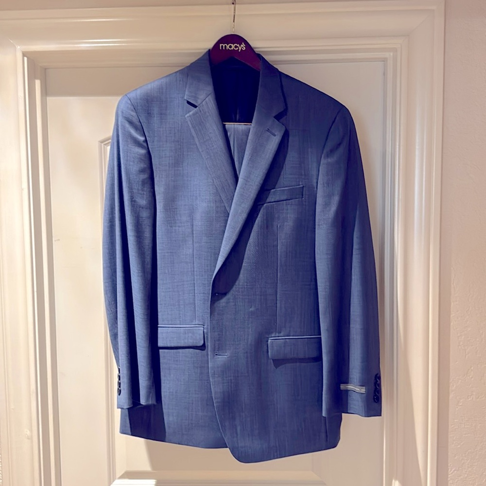 Men’s Blue Suit with tags 

Size 42 Long

32x32 pants 

Brand New